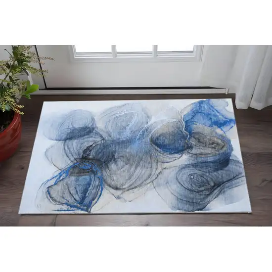 Navy Blue And Ivory Abstract Washable Area Rug With UV Protection Photo 2