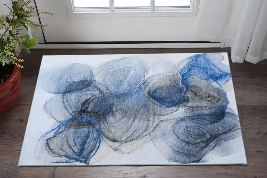 Navy Blue And Ivory Abstract Washable Area Rug With UV Protection Photo 2