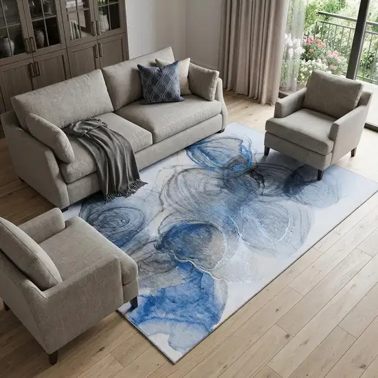 Navy Blue And Ivory Abstract Washable Area Rug With UV Protection Photo 1