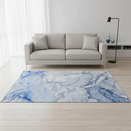 Navy Blue And Ivory Abstract Washable Area Rug With UV Protection Photo 1