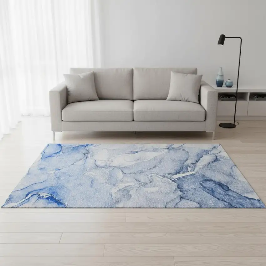 Navy Blue And Ivory Abstract Washable Area Rug With UV Protection Photo 1