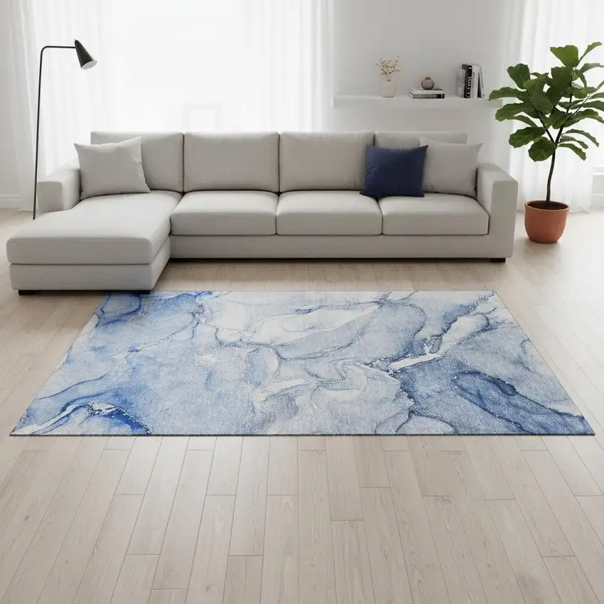 Navy Blue And Ivory Abstract Washable Area Rug With UV Protection Photo 1