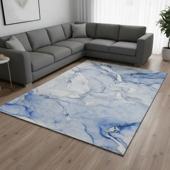 Navy Blue And Ivory Abstract Washable Area Rug With UV Protection Photo 1