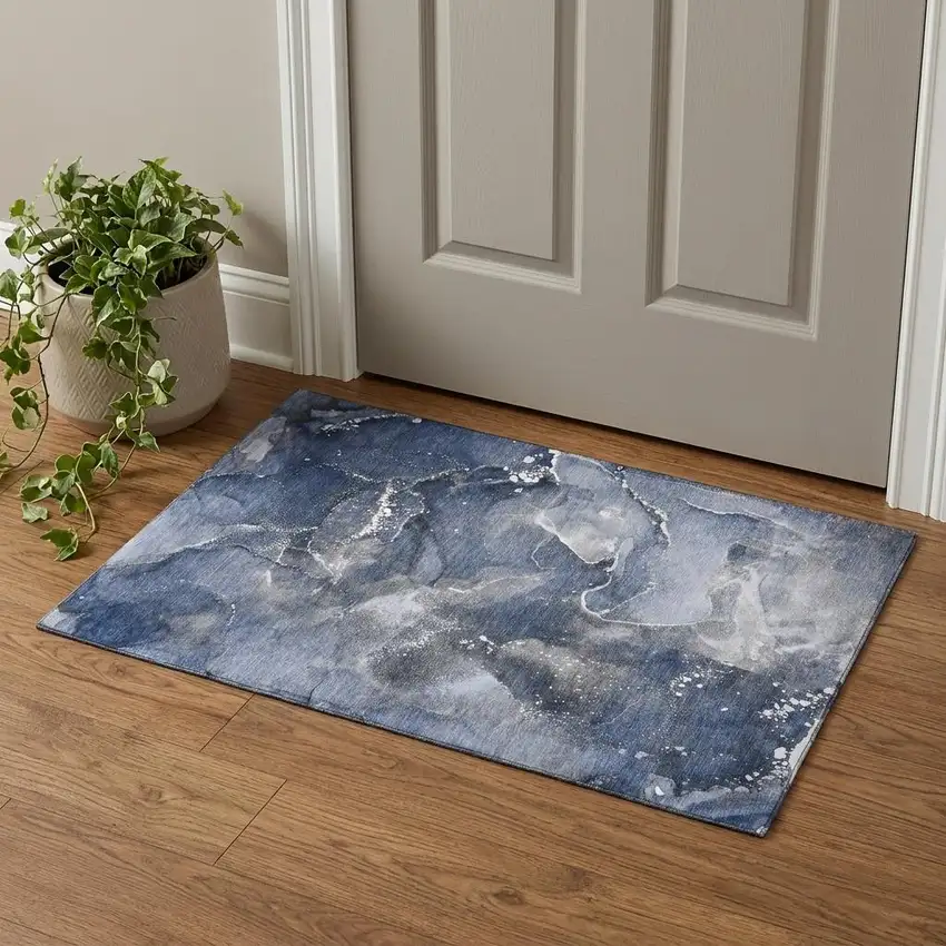Navy Blue And Ivory Abstract Washable Area Rug With UV Protection Photo 1