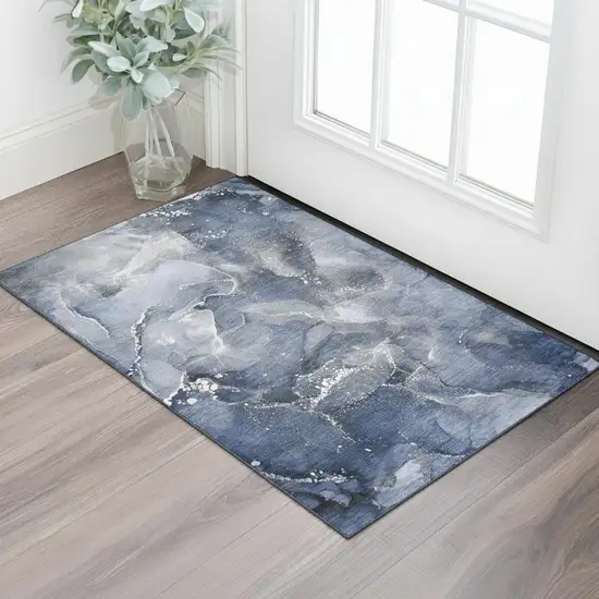 Navy Blue And Ivory Abstract Washable Area Rug With UV Protection Photo 1