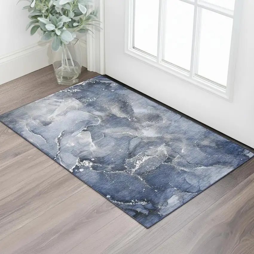 Navy Blue And Ivory Abstract Washable Area Rug With UV Protection Photo 1