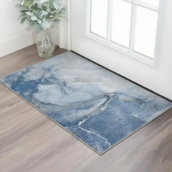 Navy Blue And Ivory Abstract Washable Area Rug With UV Protection Photo 1