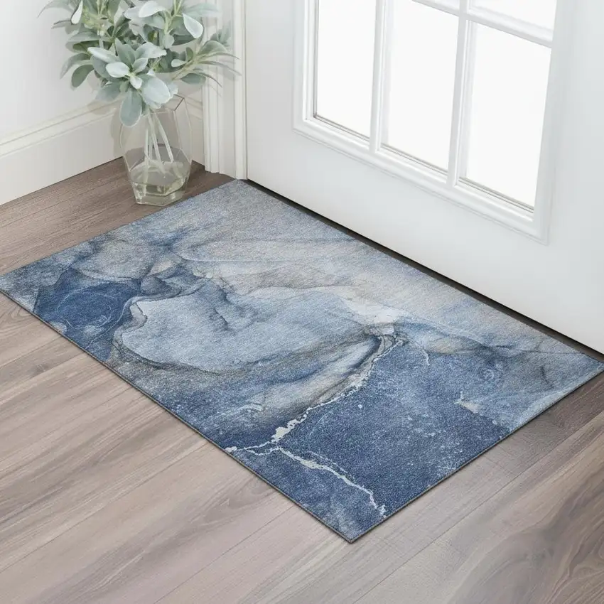 Navy Blue And Ivory Abstract Washable Area Rug With UV Protection Photo 1