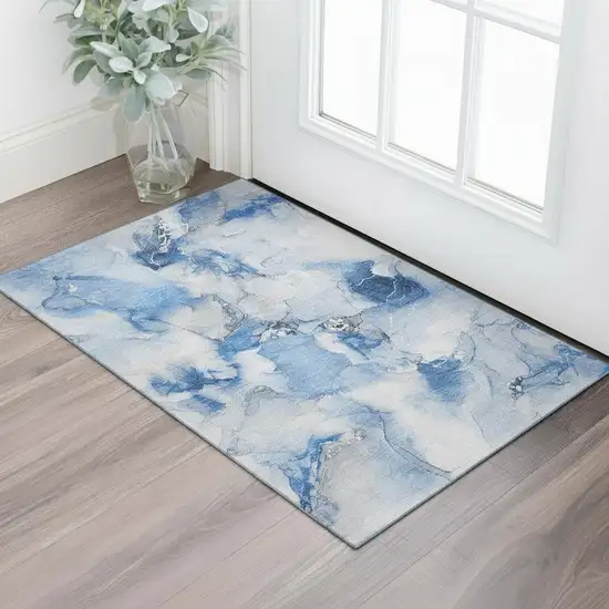 Navy Blue And Ivory Abstract Washable Area Rug With UV Protection Photo 1