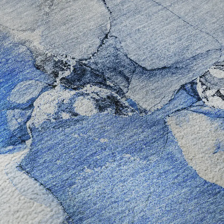 Navy Blue And Ivory Abstract Washable Area Rug With UV Protection Photo 1