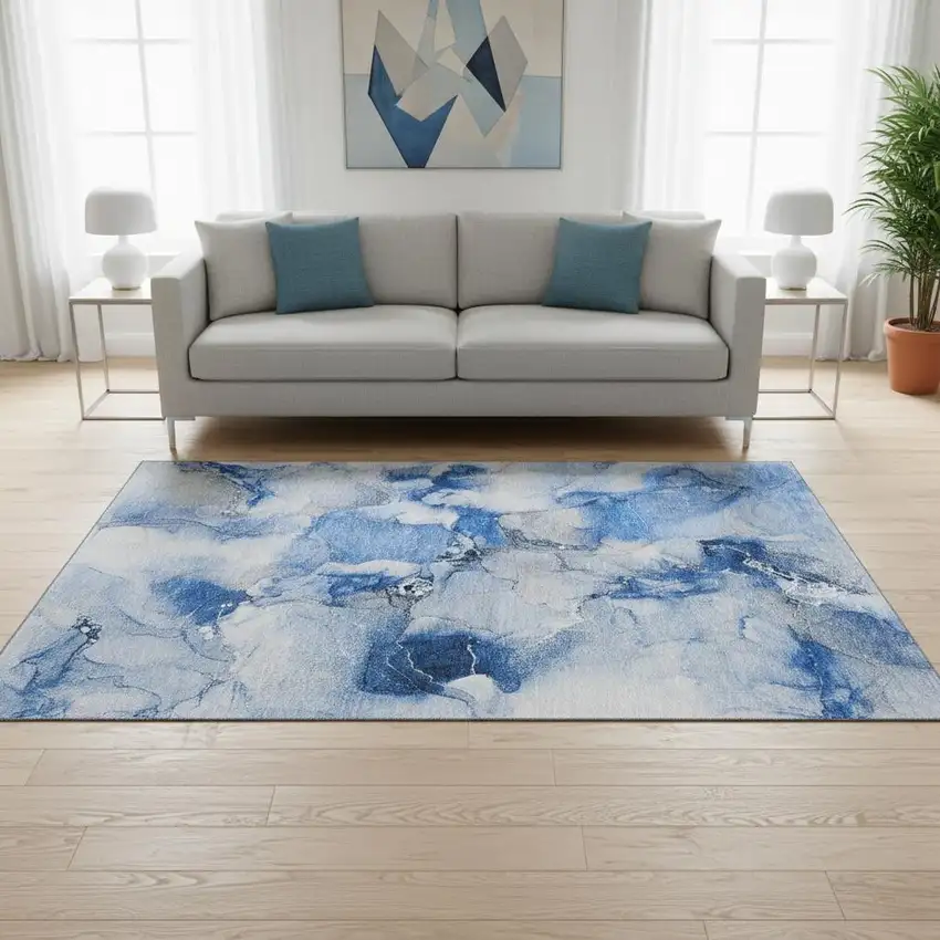 Navy Blue And Ivory Abstract Washable Area Rug With UV Protection Photo 1