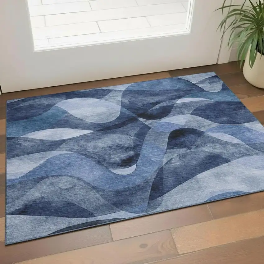 Navy Blue And Ivory Abstract Washable Area Rug With UV Protection Photo 1