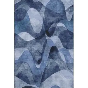 Photo of Navy Blue And Ivory Abstract Washable Area Rug With UV Protection