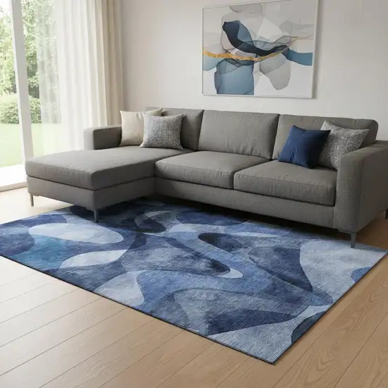 Navy Blue And Ivory Abstract Washable Area Rug With UV Protection Photo 1