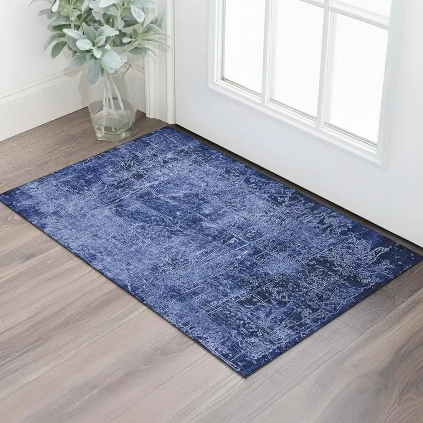 Navy Blue And Ivory Abstract Washable Area Rug With UV Protection Photo 1