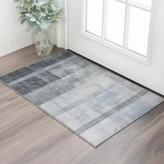 Navy Blue And Ivory Abstract Washable Area Rug With UV Protection Photo 2