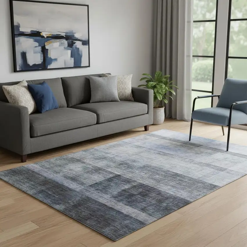 Navy Blue And Ivory Abstract Washable Area Rug With UV Protection Photo 1