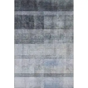Photo of Navy Blue And Ivory Abstract Washable Area Rug With UV Protection