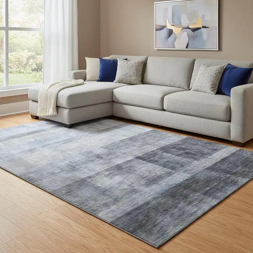 Navy Blue And Ivory Abstract Washable Area Rug With UV Protection Photo 1