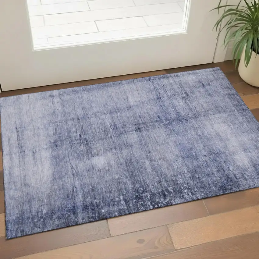 Navy Blue And Ivory Abstract Washable Area Rug With UV Protection Photo 1