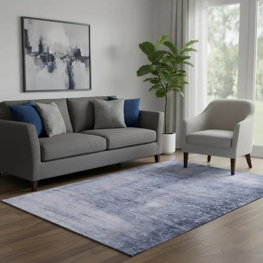 Navy Blue And Ivory Abstract Washable Area Rug With UV Protection Photo 1