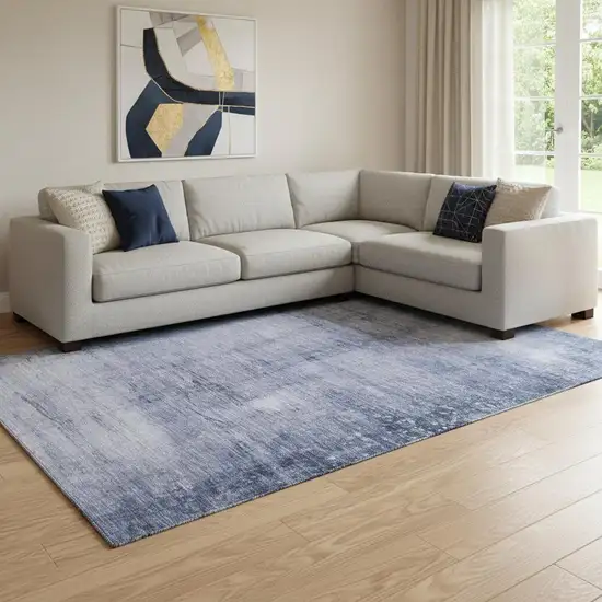 Navy Blue And Ivory Abstract Washable Area Rug With UV Protection Photo 1