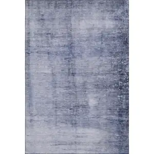 Photo of Navy Blue And Ivory Abstract Washable Area Rug With UV Protection