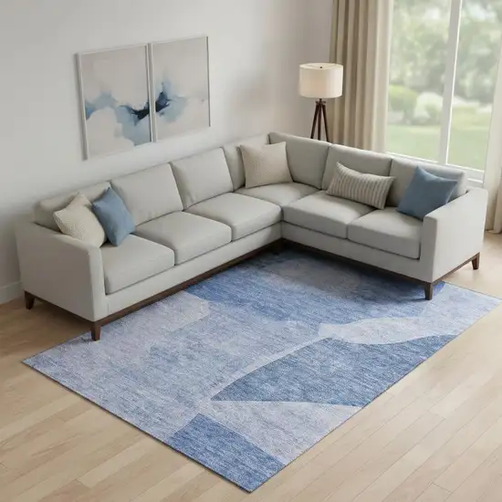 Navy Blue And Ivory Abstract Washable Area Rug With UV Protection Photo 1