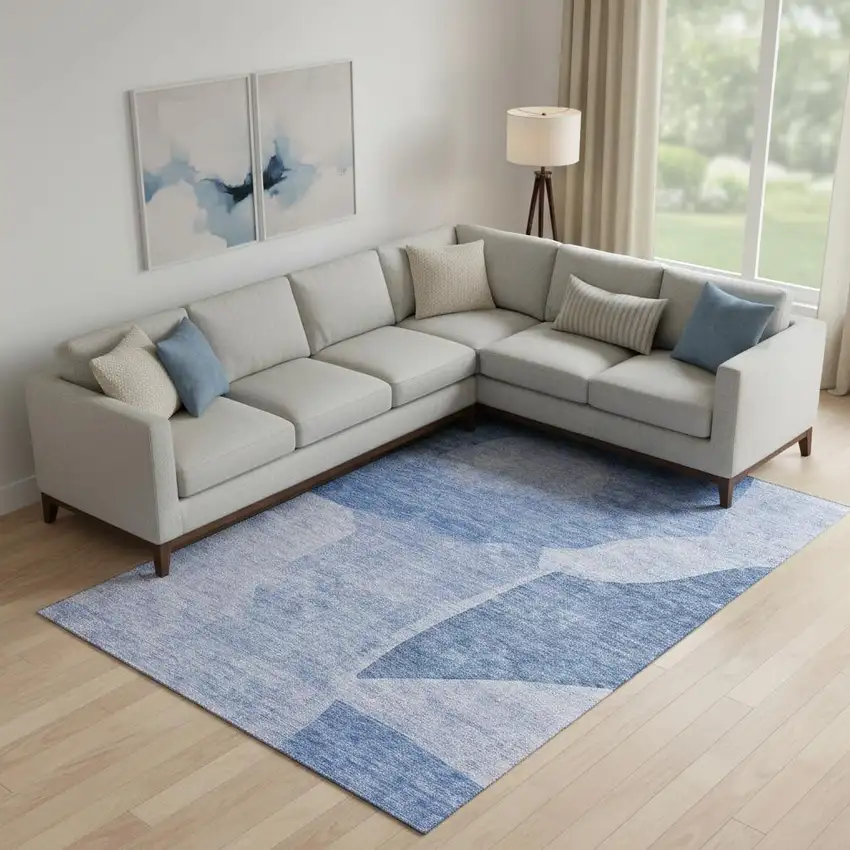 Navy Blue And Ivory Abstract Washable Area Rug With UV Protection Photo 1