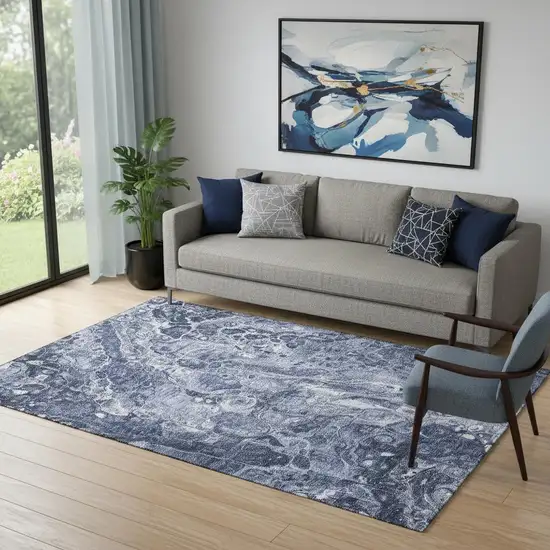 Navy Blue And Ivory Abstract Washable Area Rug With UV Protection Photo 1