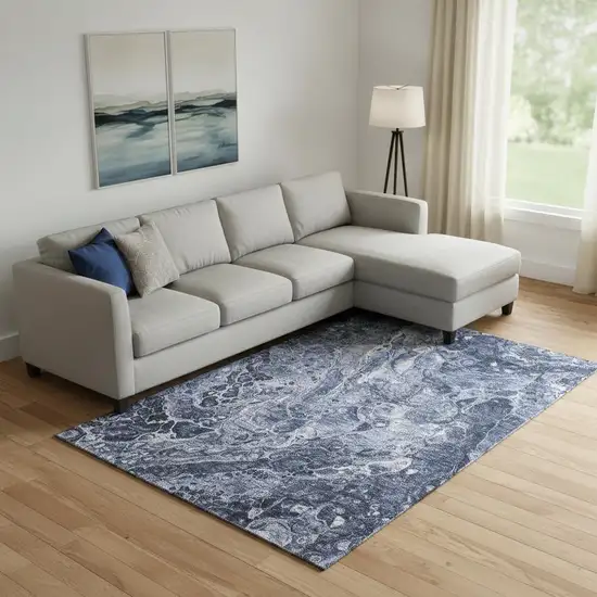 Navy Blue And Ivory Abstract Washable Area Rug With UV Protection Photo 1