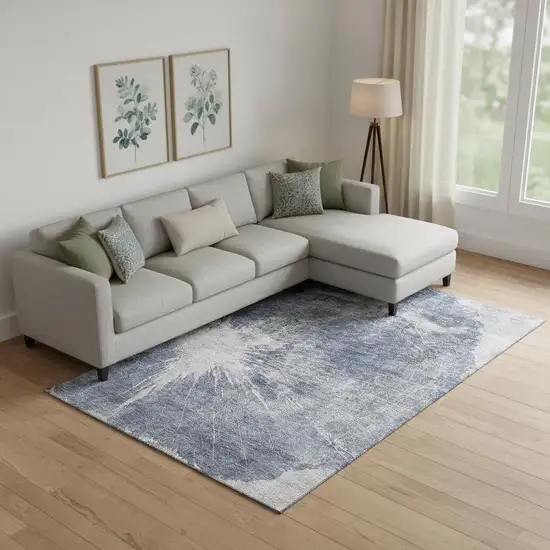 Navy Blue And Ivory Abstract Washable Area Rug With UV Protection Photo 1