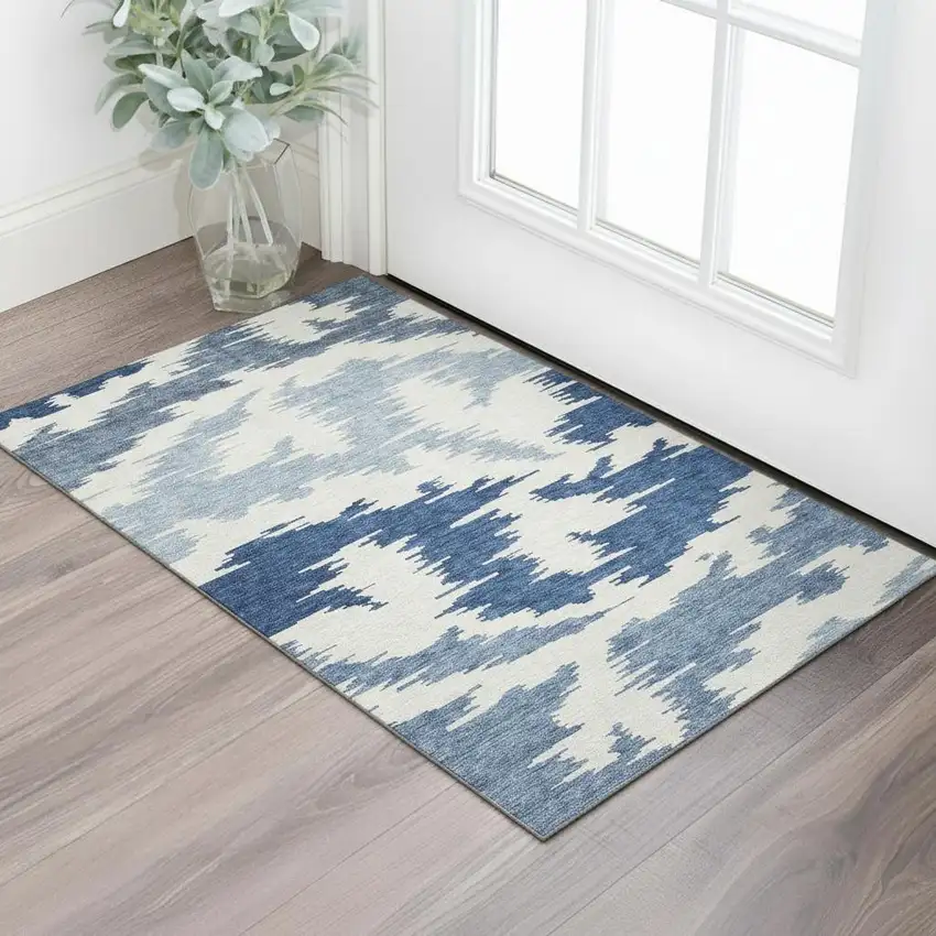 Navy Blue And Ivory Abstract Washable Area Rug With UV Protection Photo 1