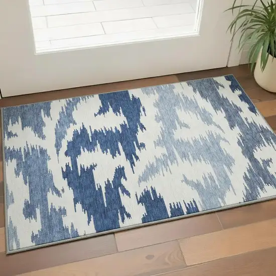 Navy Blue And Ivory Abstract Washable Area Rug With UV Protection Photo 2