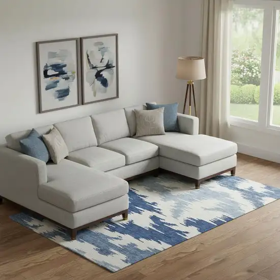 Navy Blue And Ivory Abstract Washable Area Rug With UV Protection Photo 1