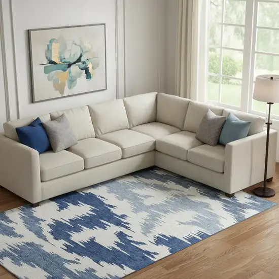 Navy Blue And Ivory Abstract Washable Area Rug With UV Protection Photo 1