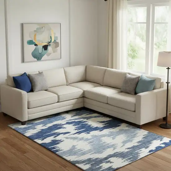 Navy Blue And Ivory Abstract Washable Area Rug With UV Protection Photo 1