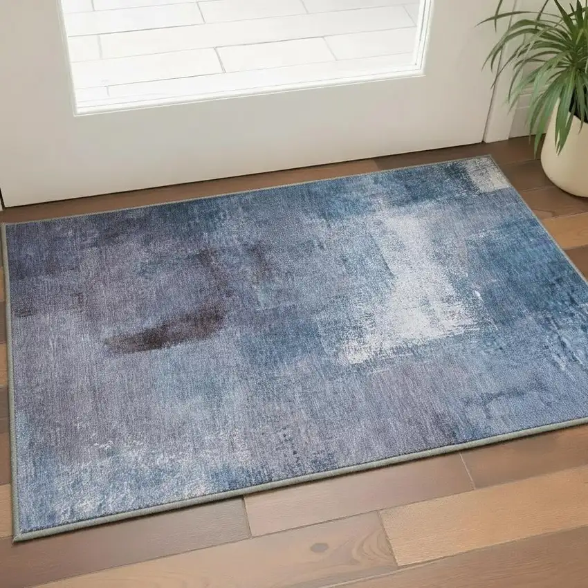 Navy Blue And Ivory Abstract Washable Area Rug With UV Protection Photo 2