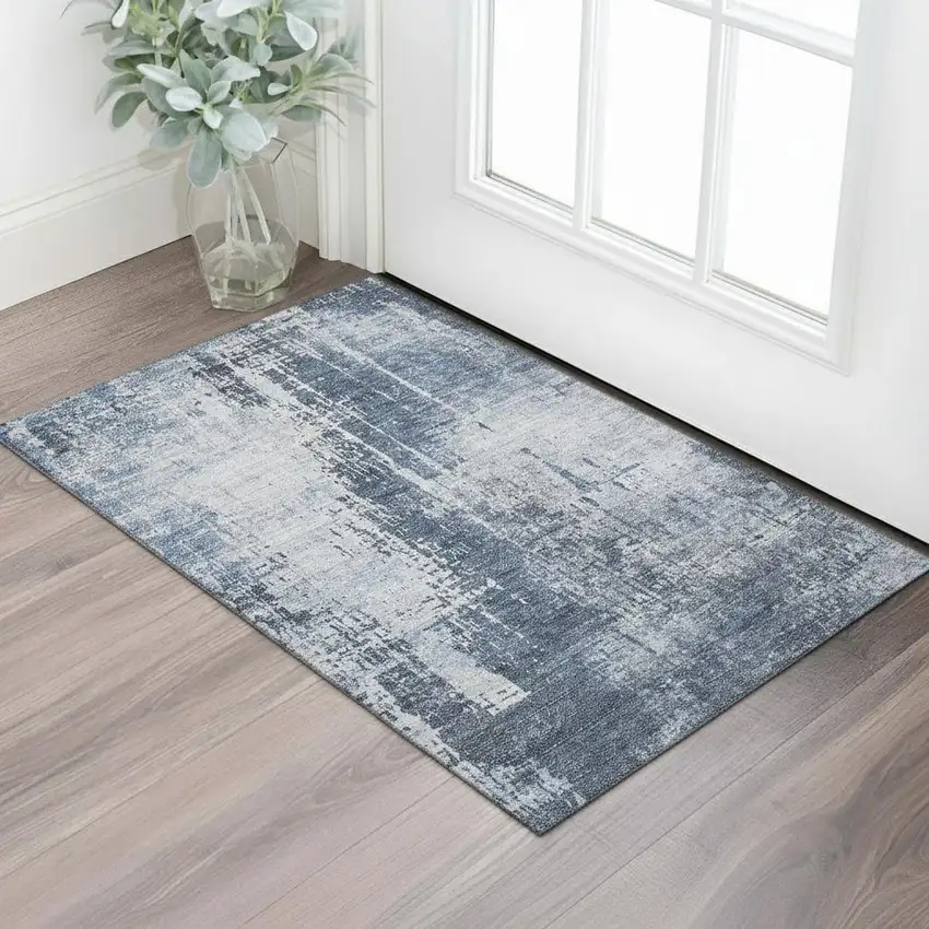 Navy Blue And Ivory Abstract Washable Area Rug With UV Protection Photo 1