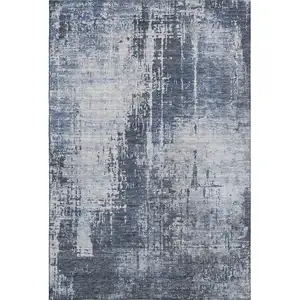 Photo of Navy Blue And Ivory Abstract Washable Area Rug With UV Protection