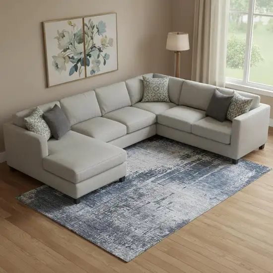 Navy Blue And Ivory Abstract Washable Area Rug With UV Protection Photo 1