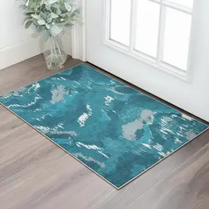 Photo of Navy Blue And Ivory Abstract Washable Area Rug With UV Protection