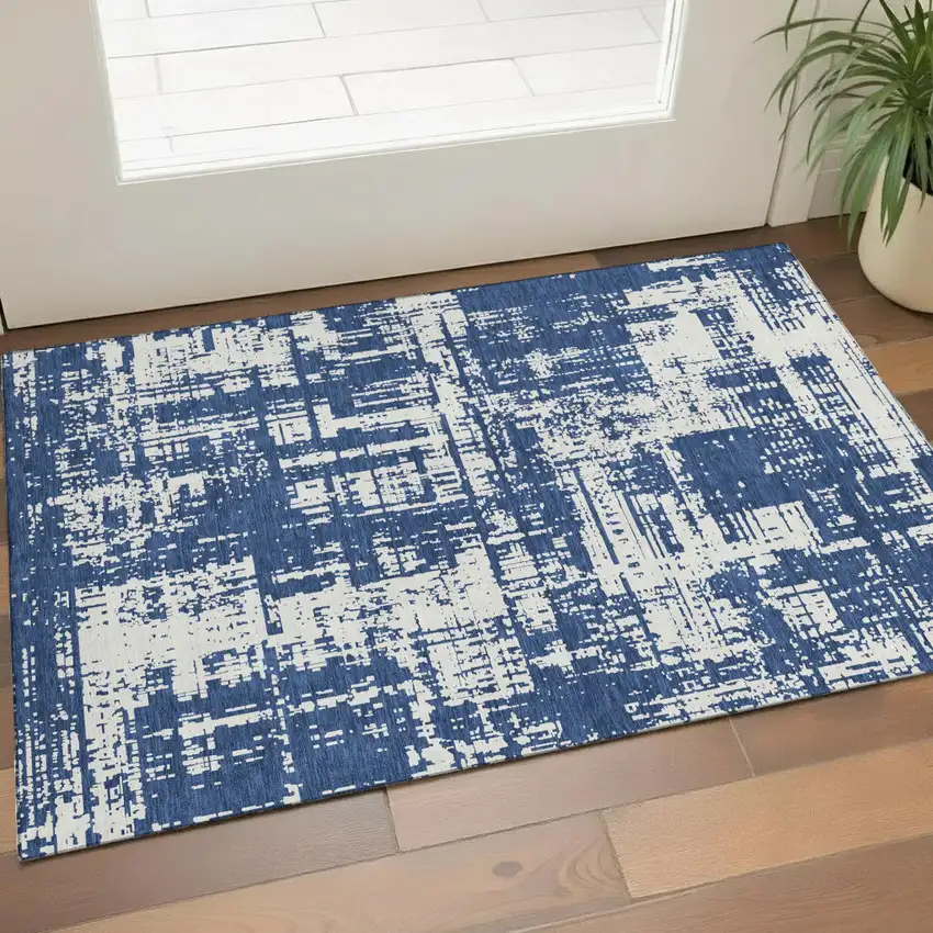 Navy Blue And Ivory Abstract Washable Area Rug With UV Protection Photo 1