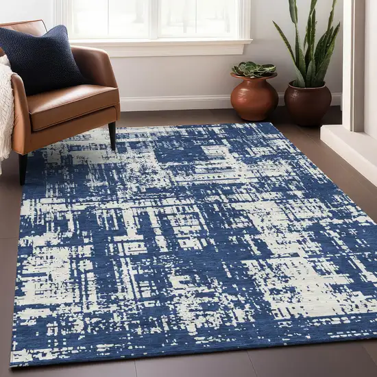 Navy Blue And Ivory Abstract Washable Area Rug With UV Protection Photo 4