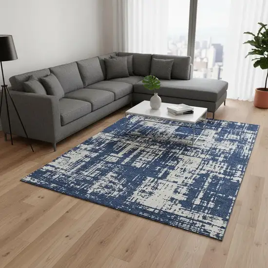 Navy Blue And Ivory Abstract Washable Area Rug With UV Protection Photo 2