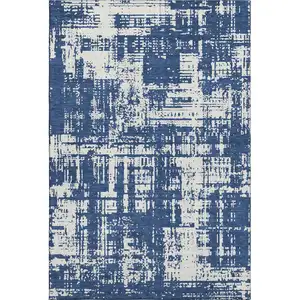 Photo of Navy Blue And Ivory Abstract Washable Area Rug With UV Protection