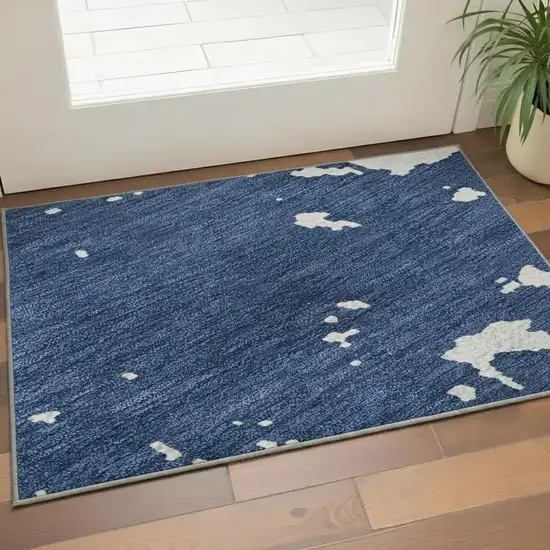 Navy Blue And Ivory Abstract Washable Area Rug With UV Protection Photo 2