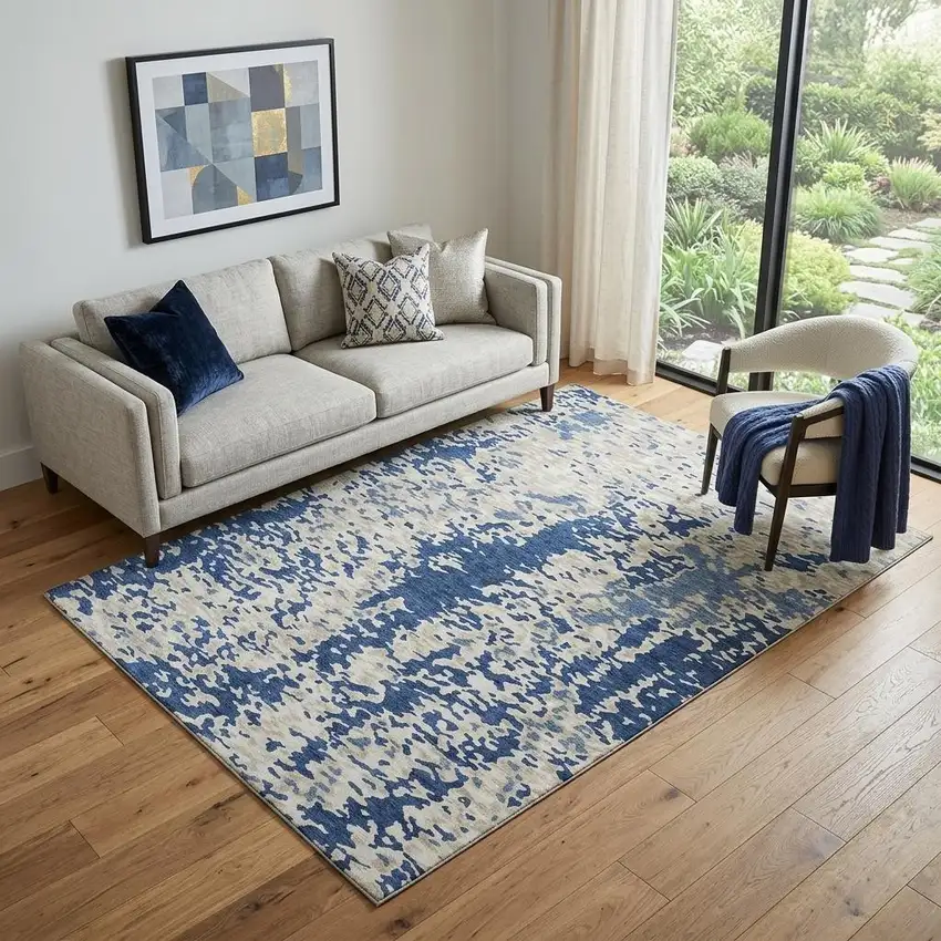 Navy Blue And Ivory Abstract Washable Area Rug With UV Protection Photo 1