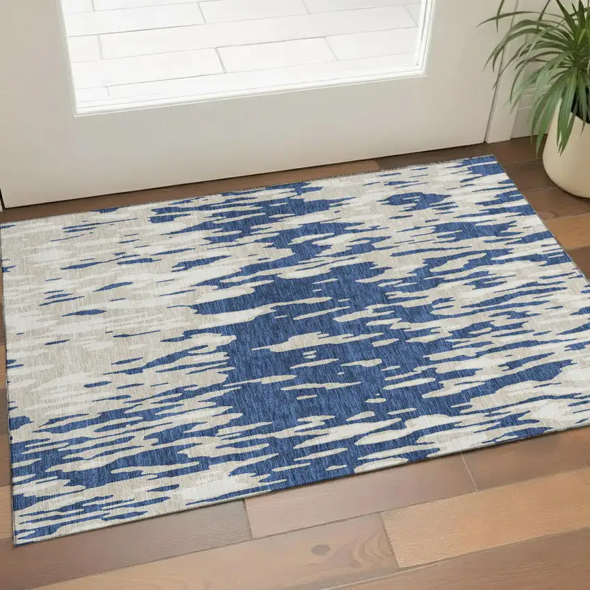 Navy Blue And Ivory Abstract Washable Area Rug With UV Protection Photo 1