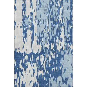 Photo of Navy Blue And Ivory Abstract Washable Area Rug With UV Protection